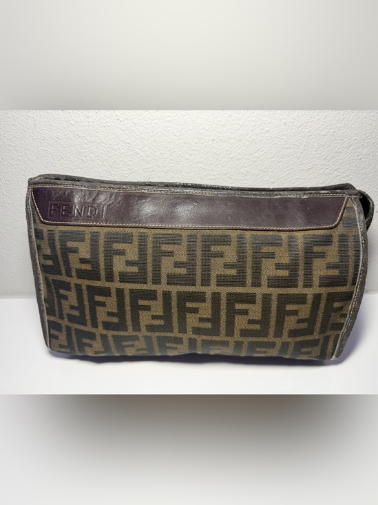Fendi Handbags - Fendi Brown Monogram Canvas Clutch with Dark Brown Trim (Fair)